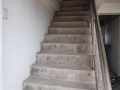 still bare concrete stairs