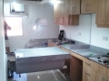 large-glass-at-kitchen-area-on-top-of-hanging-table