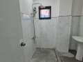 guest-bathroom-with-lights-on