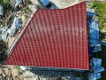 unusual-roof-contour-due-to-lot-dimensions-and-limitations